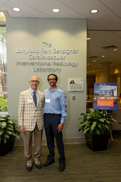 Larry Bensignor with a physician at Shady Grove Medical Center