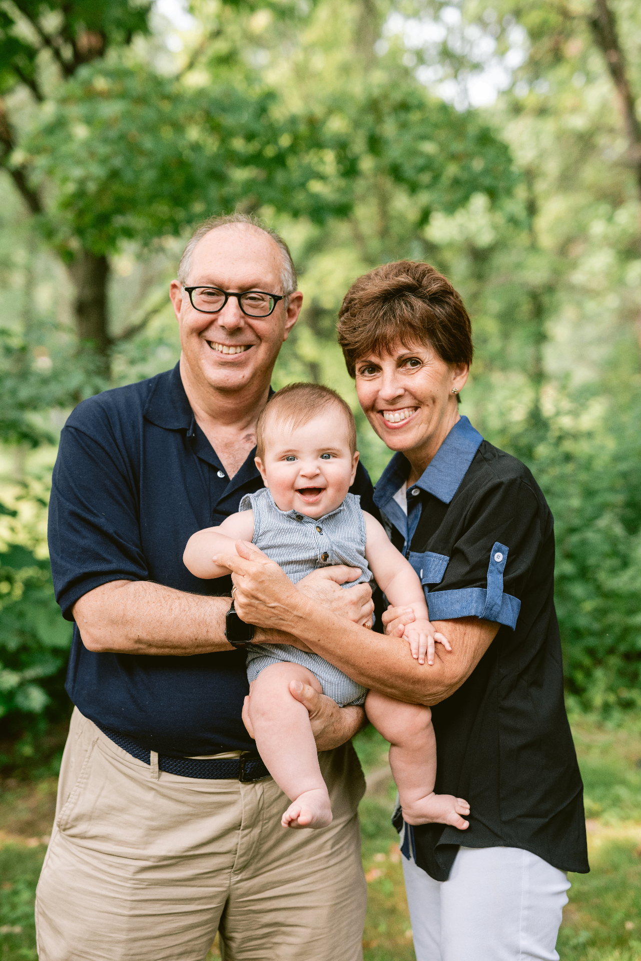 Larry and Fern with their grandchild